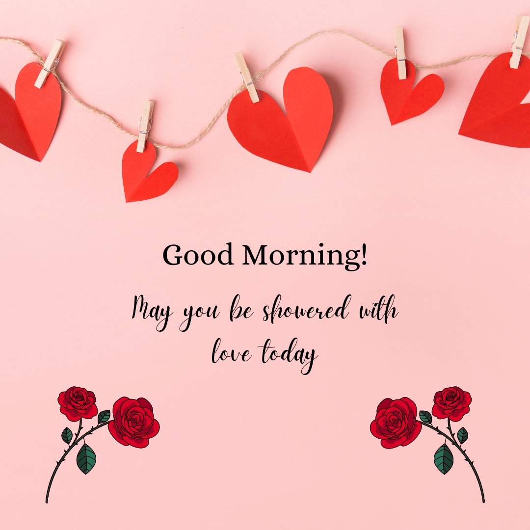 Good morning heart image featuring red paper hearts hanging on a string with clothespins on a pink background, accompanied by 'Good Morning!' text and the quote 'May you be showered with love today,' with red rose illustrations.