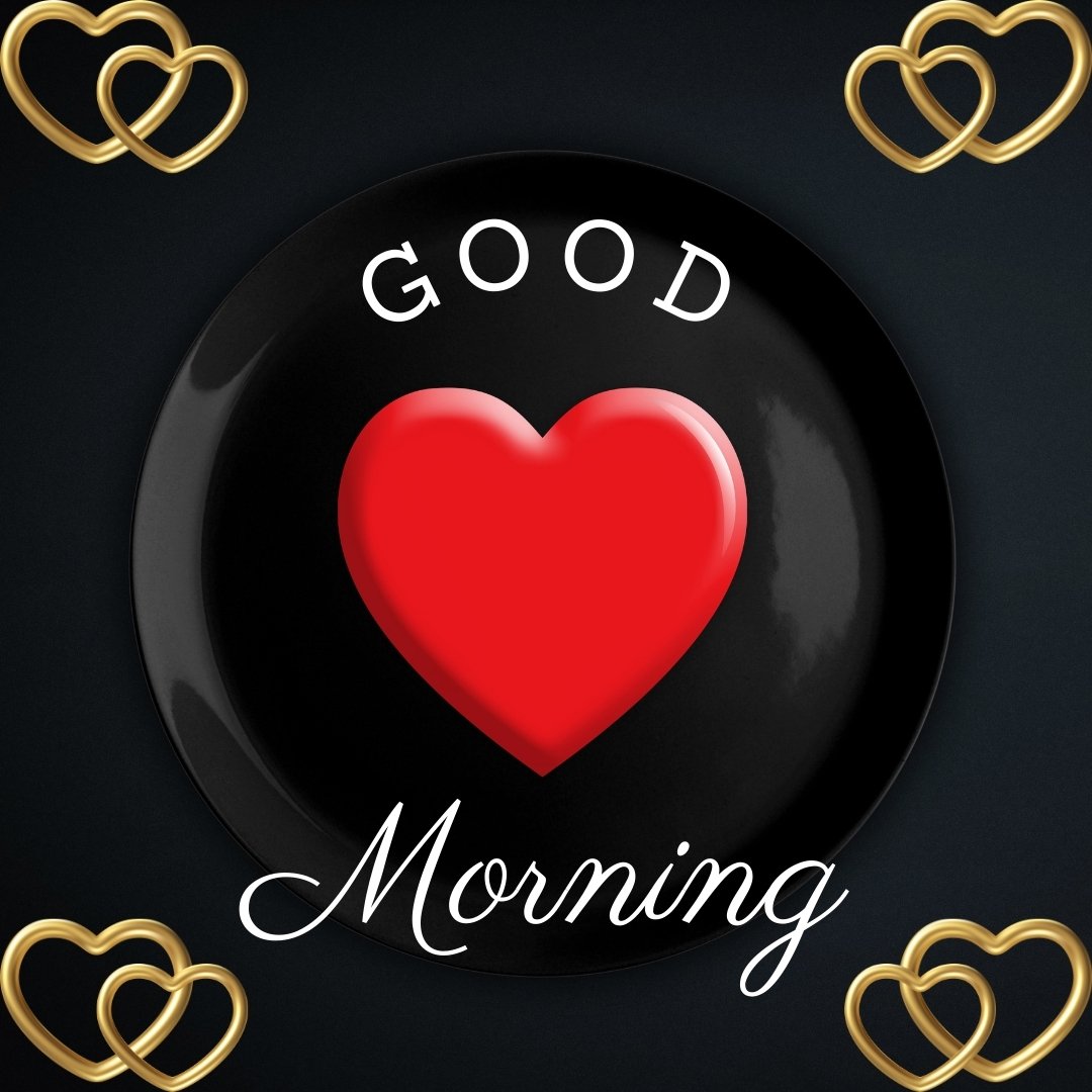 Good morning heart image displaying a bright red heart on a sleek black plate with golden heart ornaments and 'Good Morning' text in white script on a dark background.