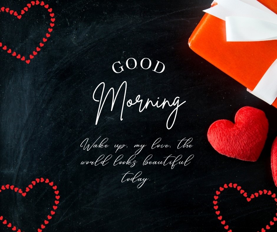 Good morning heart image with a creative presentation on a blackboard background, featuring a heart made of small red hearts and two red plush hearts near an orange gift box with a white ribbon, evoking a romantic and affectionate message.