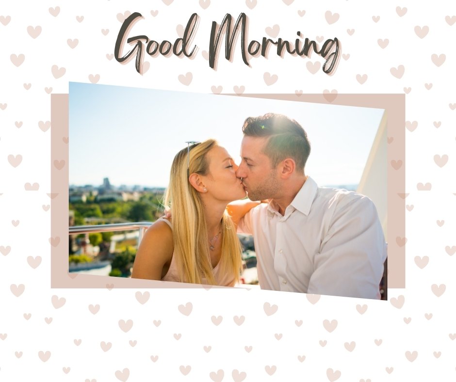 Good Morning Kiss Image featuring a joyful couple kissing on a sunny balcony, with hearts and the greeting 'Good Morning' enhancing the romantic atmosphere.